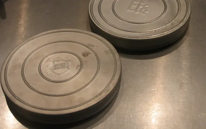 Ektachrome  and Bell & Howell brand film reel canisters