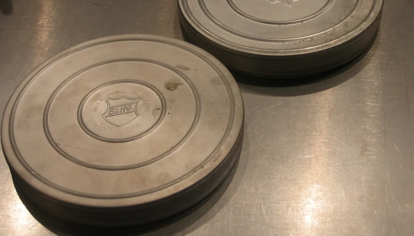 Ektachrome and Bell & Howell brand film reel canisters